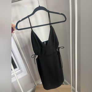 Black cut out dress. Never worn!